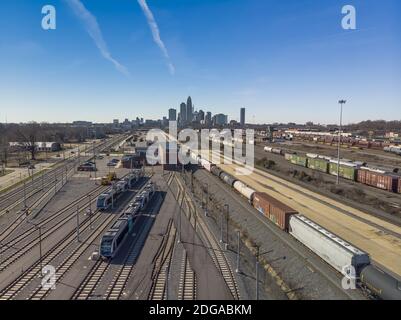 Aerial View Of A Train Yard With Charlotte, NC In The Background Stock Photo