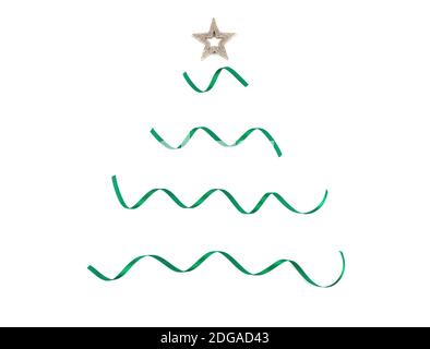 Minimalist ribbon Christmas tree with a gold star. Simple green and gold concept on white background. Flat lay. Top view. Stock Photo
