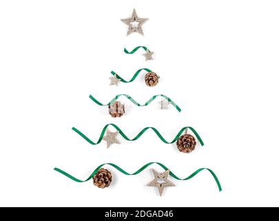 Decorated simple Christmas tree on white background. Green ribbon, pine cones, gold stars. Flat lay. Top view. Stock Photo