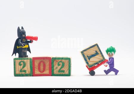 lego batman and joker assembling celebrating year 2021. minifigures are manufactured by The Lego Group. Stock Photo
