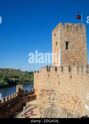Almorol castle tower with the Portuguese flag on top Stock Photo