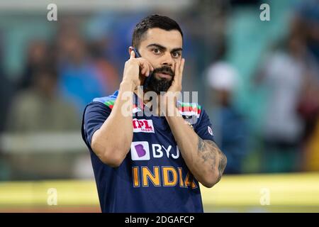 Sydney, Australia. 8th Dec 2020. Virat Kohli of India on his mobile phone during the 3rd Dettol ODI T20I Series match between Australia and India at Sydney Cricket Ground, Sydney, Australia on 8 December 2020. Photo by Peter Dovgan. Editorial use only, license required for commercial use. No use in betting, games or a single club/league/player publications. Credit: UK Sports Pics Ltd/Alamy Live News Stock Photo