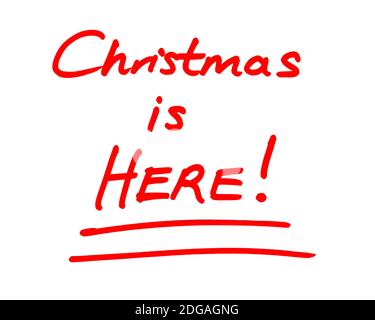 Christmas is HERE! handwritten on a white background. Stock Photo