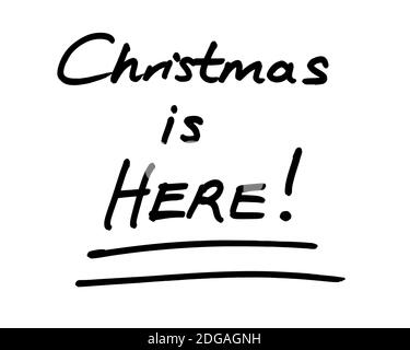 Christmas is HERE! handwritten on a white background. Stock Photo