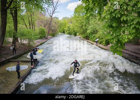 Surfing in the river Eisbach, Munich, Germany Stock Photo