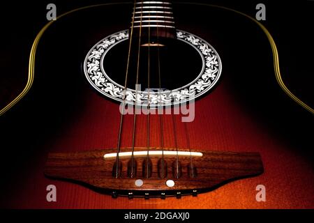 Close up of acoustic guitar on black background Stock Photo
