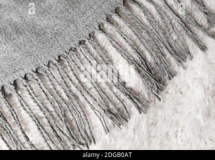 Wool warm gray scarf with fringes Stock Photo