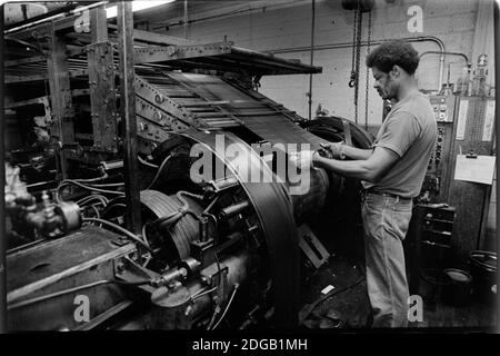 Workers at the General Tire Company in Akron, Ohio, work the final production shift for making passengers tires before the factory closed for good on August 20, 1982. More than 800 production workers lost their jobs. General Tire had been the last company to make tires in northeast Ohio city, after Goodyear, B.F. Goodrich and Firestone made cuts. Akron had been known as the Rubber Capital of the World. Ernie Mastroianni photo. Stock Photo
