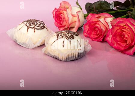 Cakes with chocolate and curd layer. Two portions. On a pink background. Birthday, holidays, sweets. Copy space. Stock Photo