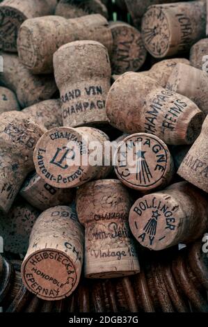 CHAMPAGNE CORKS COLLECTION FINE WINE harvest basket with variety selection of various French luxury champagne corks. France Stock Photo