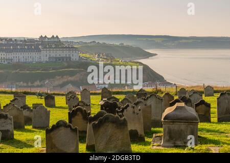 View of Whitby and North Sea from the graveyard of St Mary's Church, Whitby, Yorkshire, England, United Kingdom, Europe