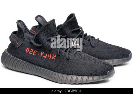 Moscow, Russia - December 2020 : Adidas Yeezy Boost 350 V2 CORE BLACK RED. Stock Photo