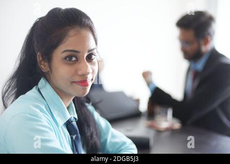 Celebrating best employee of the year/month in an Indian corporate office. Indian corporate lifestyle and success stories Stock Photo