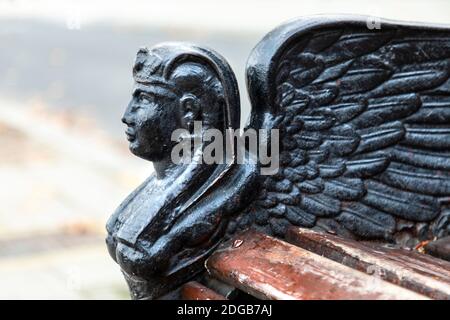 Close-up of an late 19th century Egyptian shinx detail deocrating a bench created by George John Vulliamy on Victoria Embankment, London, UK Stock Photo