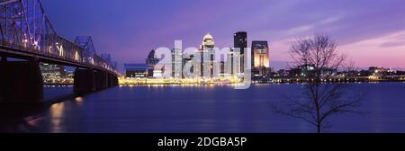 Bridge across a river at dusk, George Rogers Clark Memorial Bridge, Ohio River, Louisville, Kentucky, USA Stock Photo