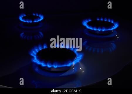 Gas. Burning blue flame kitchen stove. Stock Photo