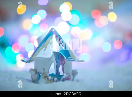 Christmas lantern as home decoration and bokeh light background. Christmas time and magic mood Stock Photo