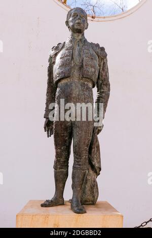 A bronze statue of the torero Antonio Ordóñez in front of the bullring. Ronda, Málaga, Andalucia, Spain, Europe Stock Photo