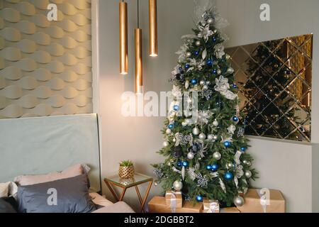 Classic Christmas decorated interior room, New year tree with silver ...