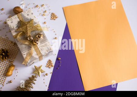 Merry Christmas and Merry Christmas and Happy Holidays greeting cards, banner. New Year. Blank sheets of paper. Christmas handmade gift box isolated Stock Photo