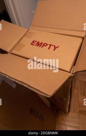 "Empty" Printed on a Moving Cardboard Box, USA Stock Photo