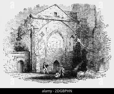 A 19th century view of young boys flying a kite in the grounds of 12th Century Tewkesbury Abbey, Gloucestershire. A fine Norman abbey church, it was originally part of a monastery, which was saved from the Dissolution of the Monasteries by King Henry VIII after being bought by the townspeople for the price of the lead on the roof to use as their parish church.  Most of the monastery buildings were destroyed during this time. Stock Photo