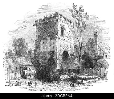 A 19th century view of the ancient gatehouse of 12th Century Tewkesbury Abbey, Gloucestershire. A fine Norman abbey church, it was originally part of a monastery, which was saved from the Dissolution of the Monasteries by King Henry VIII after being bought by the townspeople for the price of the lead on the roof to use as their parish church.  Most of the monastery buildings were destroyed during this time. Stock Photo