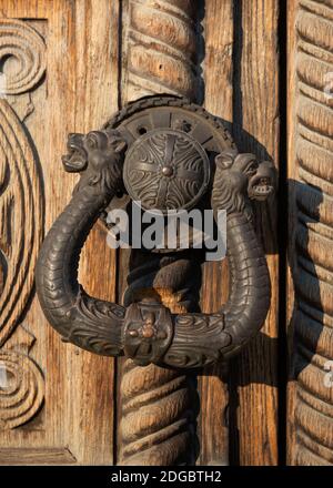 Old carved wood panel door close up detail of the historic St. Alexander Nevsky Orthodox Cathedral church in Sofia Bulgaria Eastern Europe Stock Photo