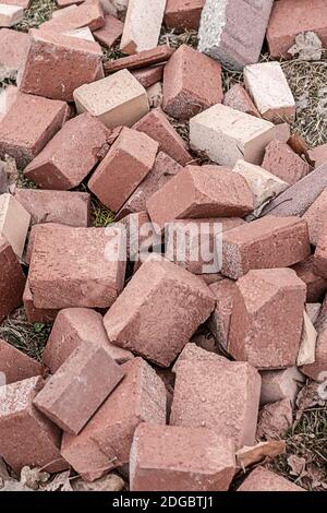 Stone pile of broken cobblestone tiles for laying garden paths Stock Photo