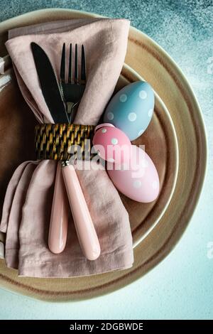 Easter place setting with Easter egg decorations Stock Photo
