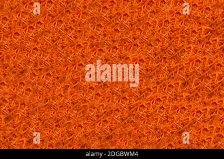 Texture of fresh grated red carrots in the form of a pattern Stock Photo