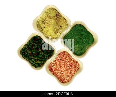 Four ceramic bowls with a collection of spices green pepper pot with salt and spices garlic and dill Stock Photo