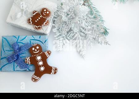 Decorative figure of a gingerbread man on a Christmas background. Decorative Christmas picture with a copy space. Stock Photo