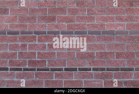 Brick red background with borders of narrow rectangular stone border symmetrical texture Stock Photo