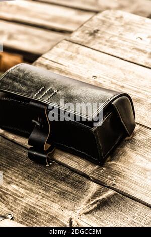 Photo in vintage style, leather black bag for military times of the Russian-Turkish war of 1877-1878 Stock Photo