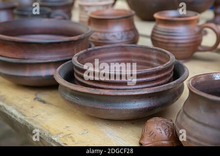 Crockery set of home utensils, a bowl and a plate standing on the table close-up Stock Photo