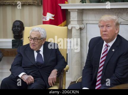 May 10, 2017 - President Donald Trump meets former Secretary of State Henry Kissinger in the Oval Office at the White House. (Molly Riley/Polaris) Stock Photo