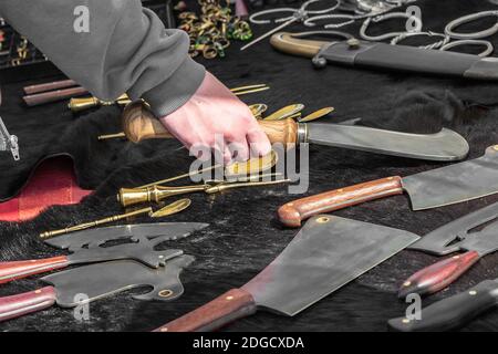 Metal ax pattern pick picking tool on black background design many knives Stock Photo