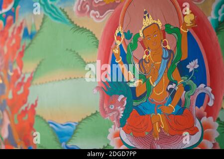 Tibetan buddhist painted mural on a wall at Karsha monastery, near Padum Zanskar Valley, Ladakh, Jammu and Kashmir, northern India Stock Photo