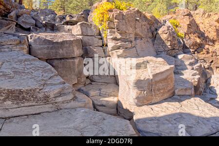 The blocky cliffs of Sycamore Falls in the Kaibab National Forest near Williams Arizona. The waterfalls at this time of year are dry and inactive. Stock Photo