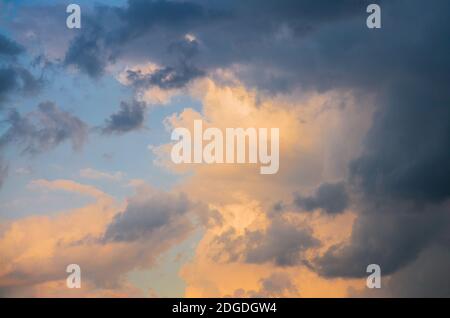 Dramatic sunset sky orange and purple clouds Stock Photo