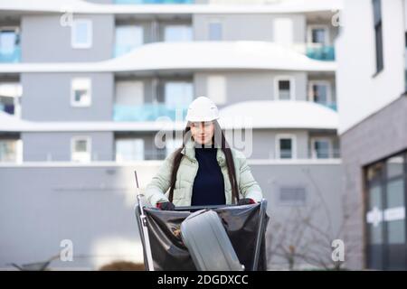 worker asia woman with winter jacket working outside Stock Photo
