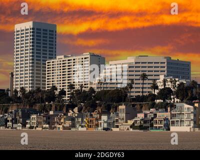 Pacific ocean view homes with sunset sky at famous Santa Monica beach in Los Angeles County, California. Stock Photo