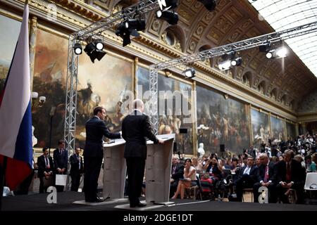 French President Emmanuel Macron (R) gestures as he speaks during a joint press conference with Russian President Vladimir Putin (L) in the Galerie des Batailles (Gallery of Battles) following their meeting at the Versailles Palace, near Paris, on May 29, 2017.French President Emmanuel Macron hosts Russian counterpart Vladimir Putin in their first meeting since he came to office with differences on Ukraine and Syria clearly visible. Photo by Stephane De Sakutin/Pool/ABACAPRESS.COM