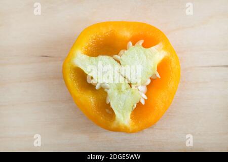 Cross section of yellow bell pepper, top view. Stock Photo