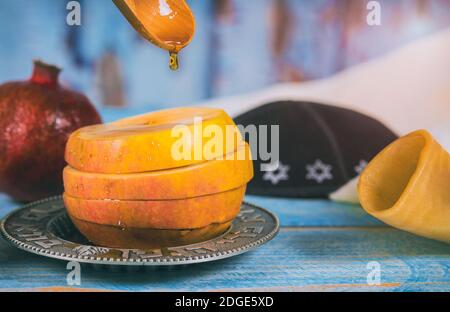 Jewish Holiday Rosh hashanah honey and apples with pomegranate Stock Photo