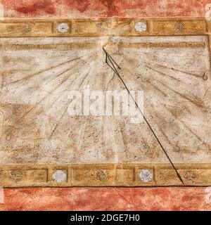 In italy sundial and   antique  wall Stock Photo