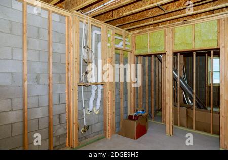 New residential construction home framing with basement view Stock Photo