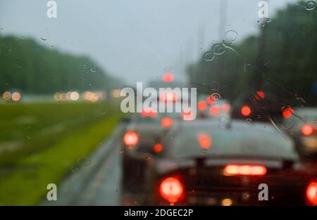 Heavy traffic during a rainy day rain drops on the window Stock Photo