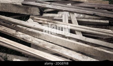 Old used wooden planks after renovation of the premises Stock Photo